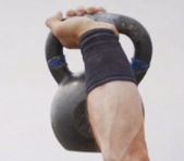 World Champion CrossFit athlete demonstrating poor kettlebell technique